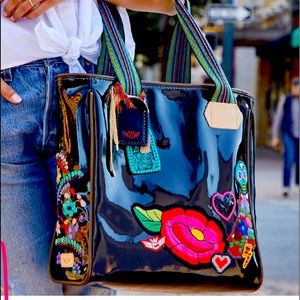 Consuela Poppy Classic Tote features all over black ConsuelaCloth™, embellished